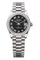 Oyster Perpetual Datejust 31 in 18 ct white gold features a bright black dial and a President bracelet 278289RBR-Black