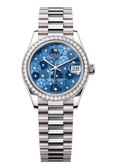Oyster Perpetual Datejust 31 in 18 ct white gold features an azzurro-blue floral-motif, diamond-set dial and a President bracelet 278289RBR-Blue 1