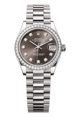 Rolex Oyster Perpetual Datejust 31 in 18 ct white gold features a dark grey, diamond-set dial and a President bracelet 278289RBR-Grey